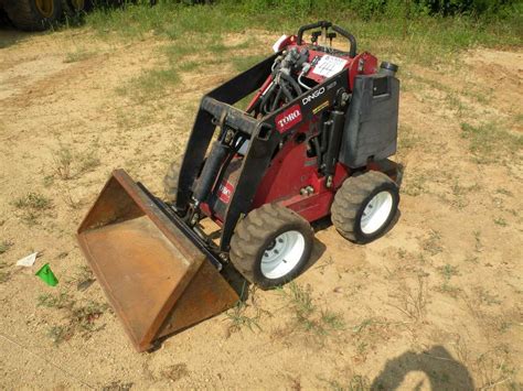 stand on skid steer dingo with bucket|used dingo for sale near me.